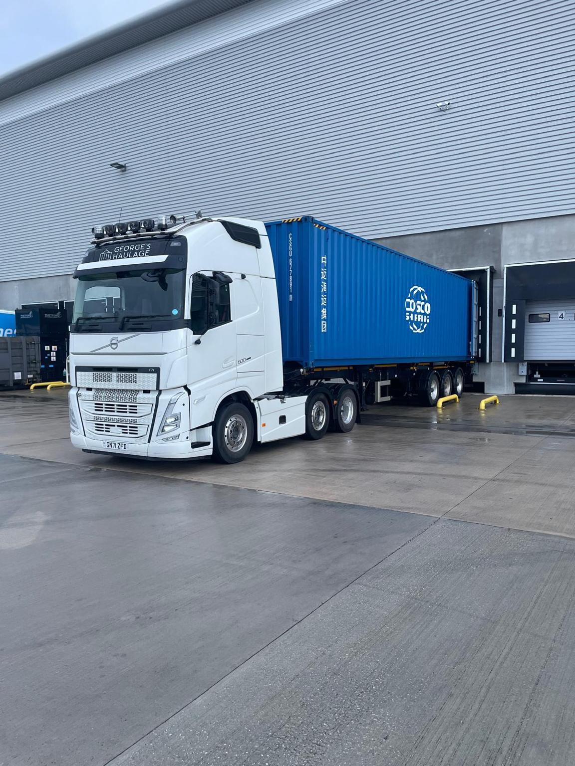 George's Haulage Volvo with a COSCO container at the warehouse
