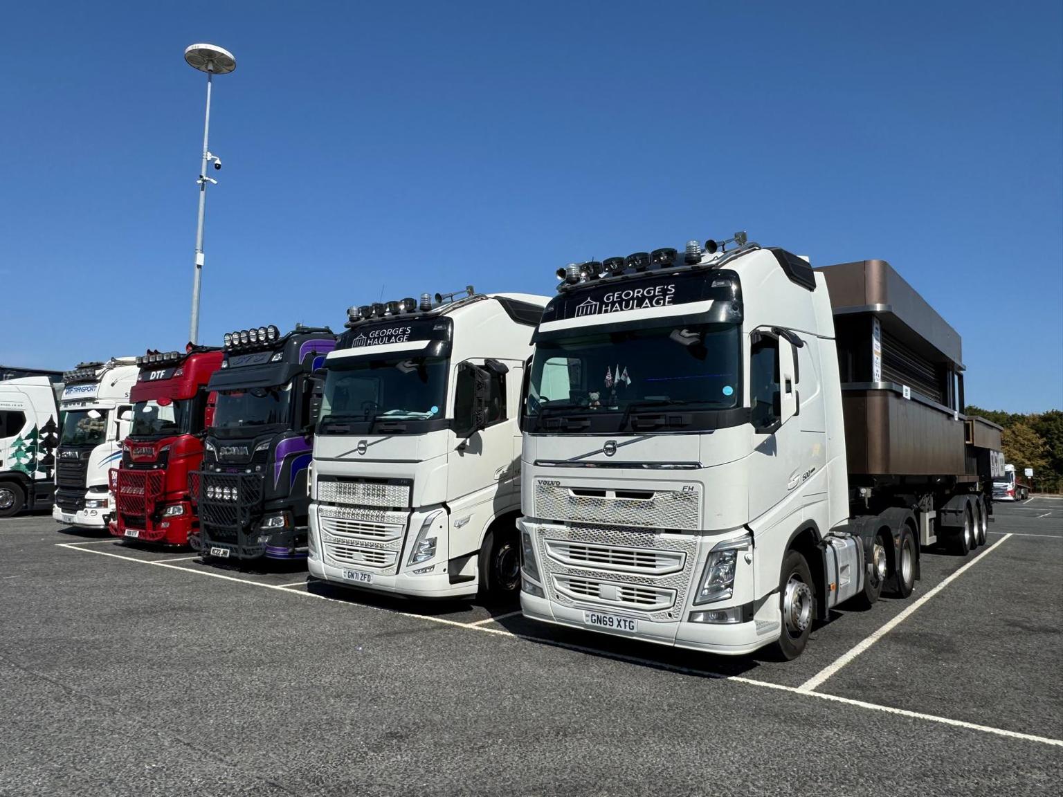 George's Haulage fleet parked up on a sunny day